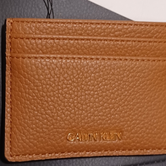 CALVIN KLEIN ID FLAT TAN BROWN LOGO WALLET
MEASURE - Picture 3 of 7